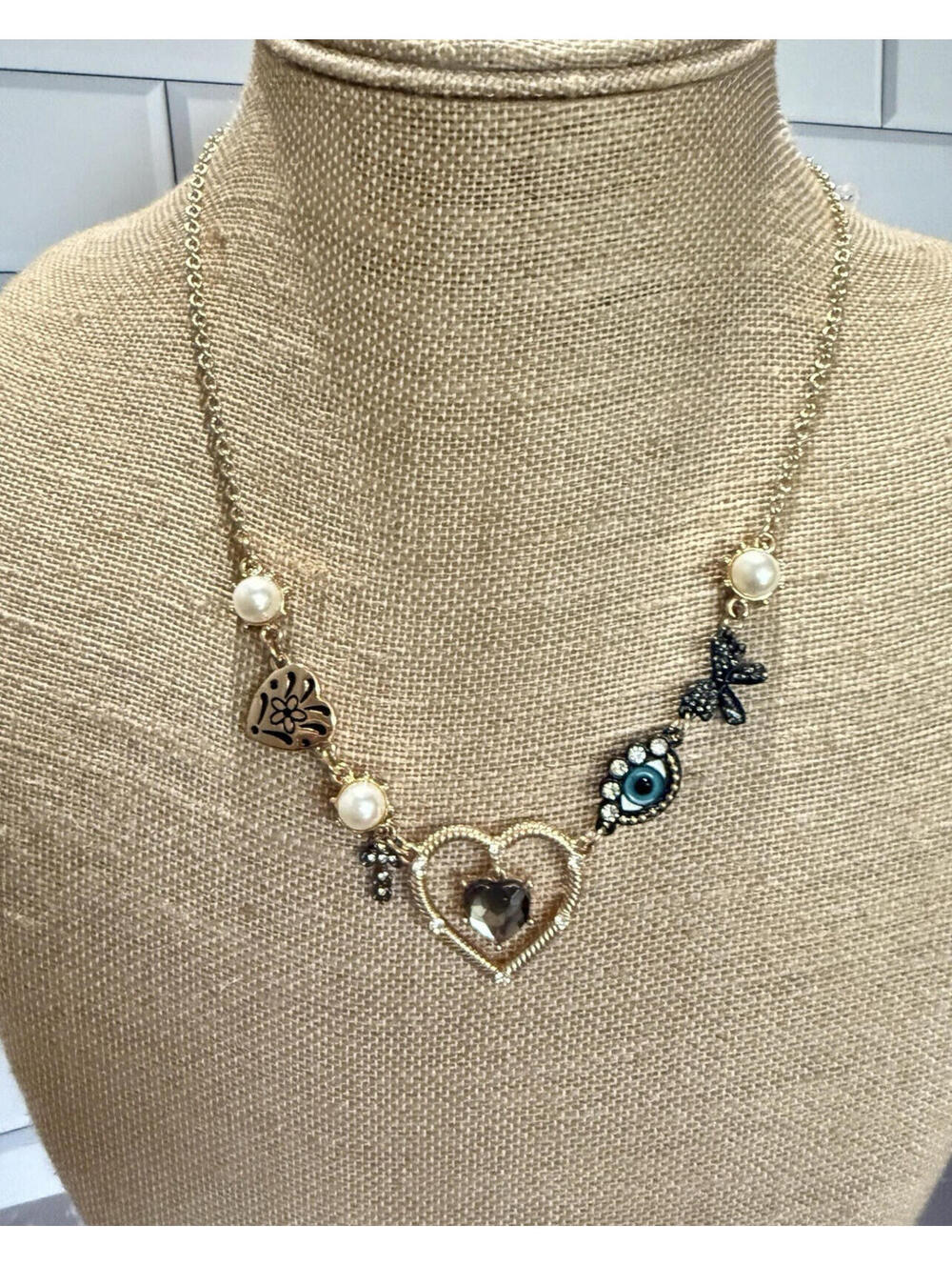 Betsey Johnson Necklace With Hearts, Cross, Evil Eye & Multi Shaped Pendants